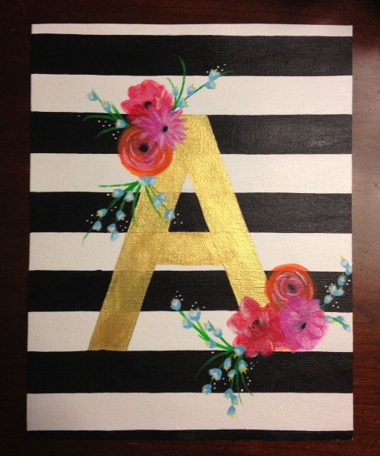 Striped painted canvas with initial and flower decorations