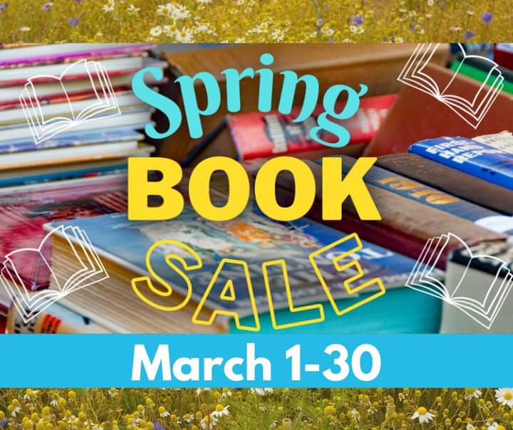 Books on the grass with Spring Book Sale 