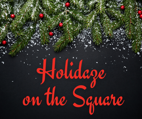 Pine branches and holly berries and the words Holidaze on the Square